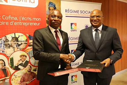 Signature de convention entre la société de compagnie financière africaine Côte d'Ivoire S.A et la Caisse Nationale de Prévoyance Sociale