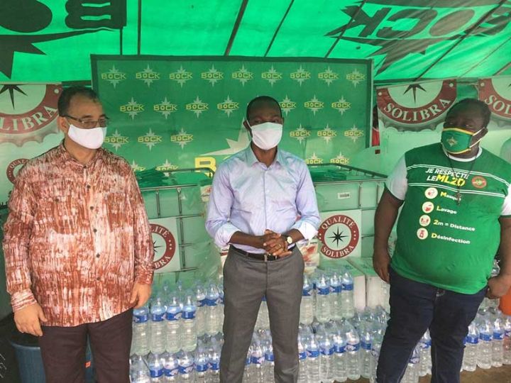 Lutte contre le coronavirus COVID-19: SOLIBRA offre des équipements de protection aux commerçants du marché de Jean Folly