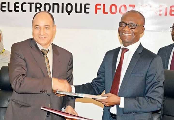 Une convention signée pour offrir une solution de monnaie électronique